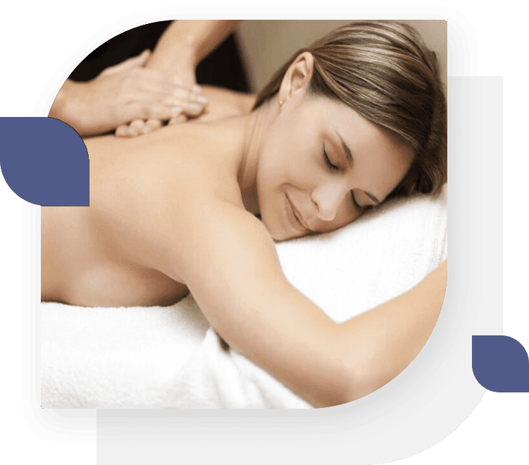 A woman laying on her stomach getting a massage.