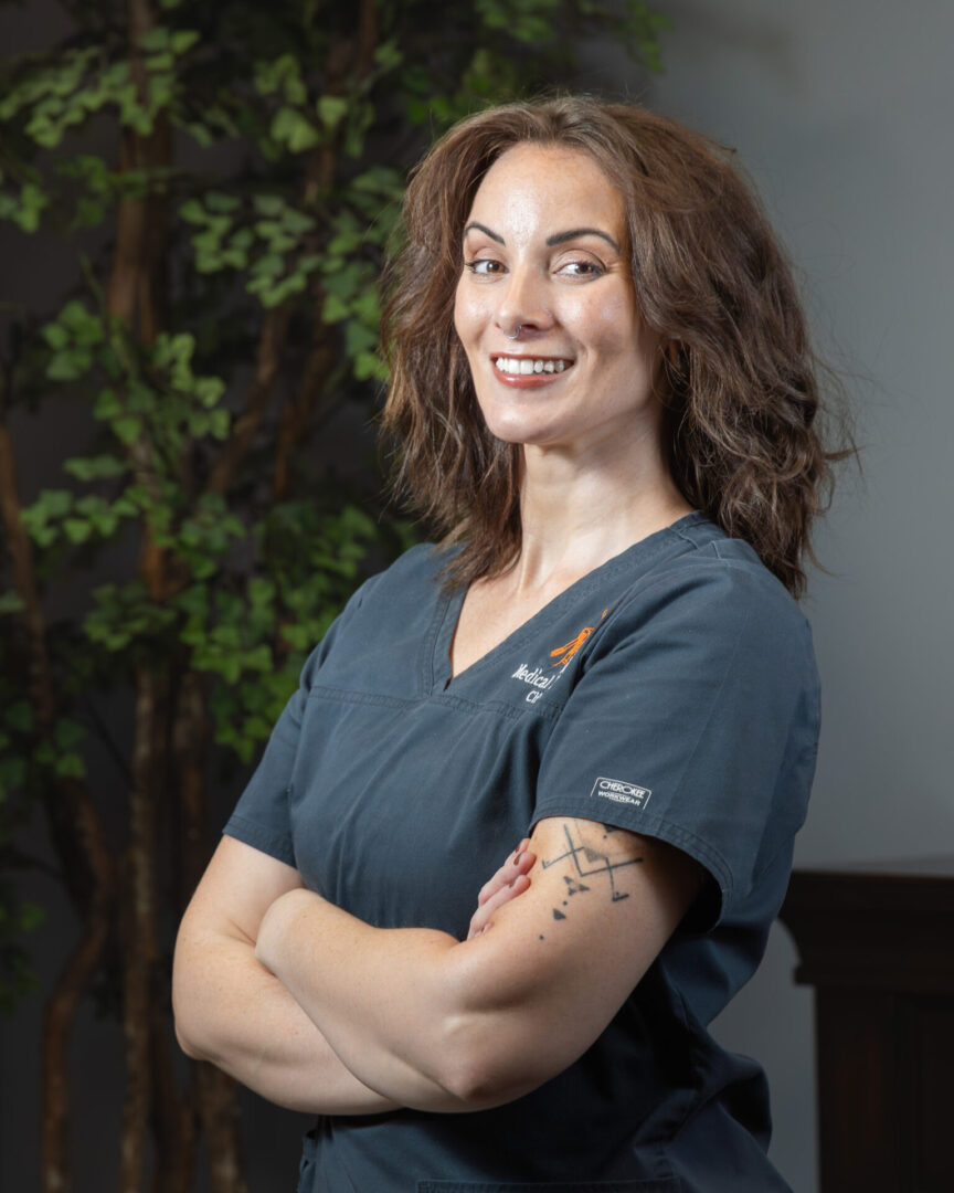 A woman posing for a picture and smiling