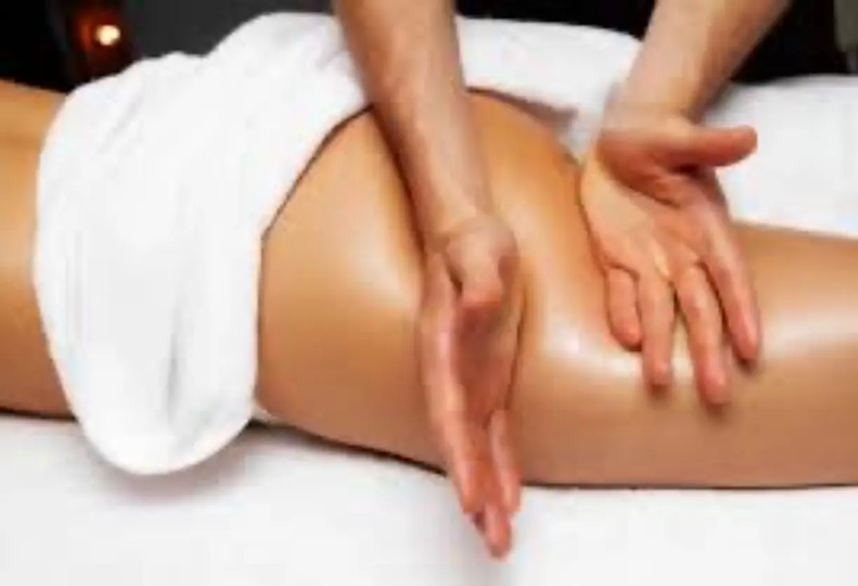 A person is getting their back turned to massage