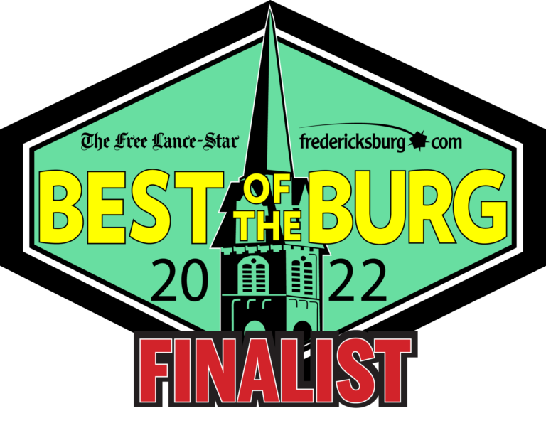 A green diamond with the words best of the burg 2 0 1 2 and finalist in the frederick county area.